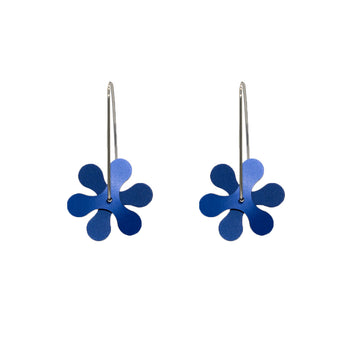 A pair of drop earrings made from two propeller shapes layered over the top of each other in blue.