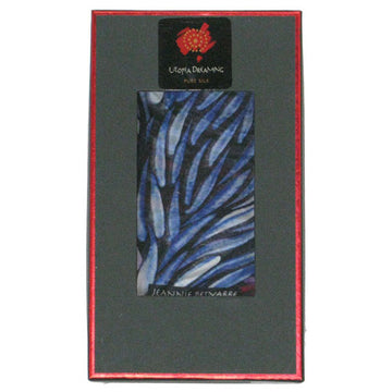 Rectangle Australian made silk chiffon scarf 50cm x 150cm. Black gift-box, red trim, Utopia Dreaming label. Artwork, by Jeannie Petyarre; swirling purple, blue, white, red leaf shapes; black trim.