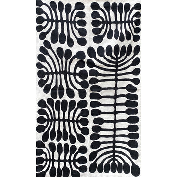 Rug featuring artwork by Mitjili Napurrula in black and white.