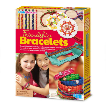 Front cover of Friendship Bracelets kit featuring a photo of two girls wearing bracelets, images of completed bracelets and the tool using to help make them.