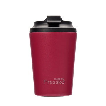 A dark red reusable coffee mug with a black lid and the text 'Made by Fressko' at the bottom.