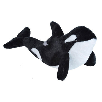 A soft toy in the shape of an orca whale.