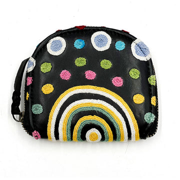 A black coin purse embroidered with coloured spots and arches by Yaritji Heffernan.