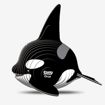 Side view of a 3D orca made up of coloured cardboard stacked together.