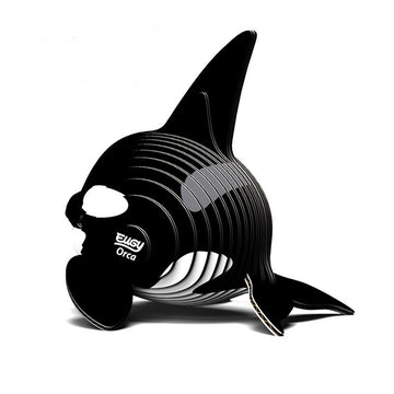 Side view of a 3D orca made up of coloured cardboard stacked together.