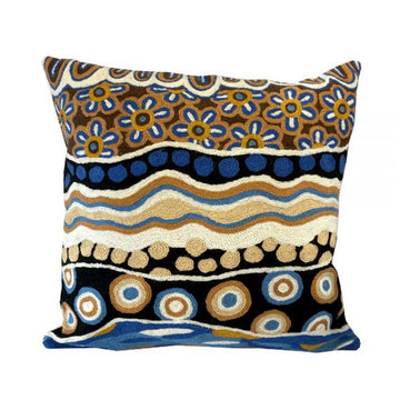 Woven woollen, zippered cushion cover 40cm x 40cm, stitched onto cotton base. Artwork by Bianca Gardiner-Dodd. Symbolic floral shapes, concentric circles, dots, wavey lines; black, white, blue, yellow, brown ochre.