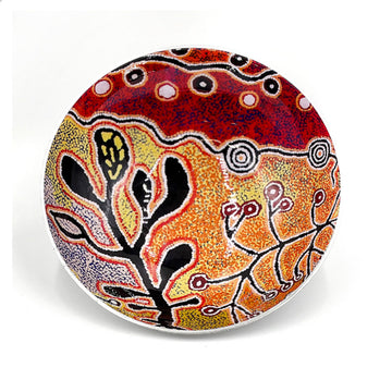 A small stainless steel bowl printed with artwork by Paddy Stewart on the inside.