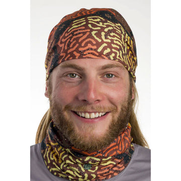 Fabric in a tubular shape printed with artwork by Roxanne Anderson in shades of brown.