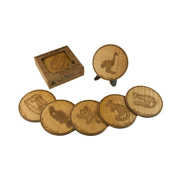 A set of six wooden round coasters etched with animals. There is a box of coasters at the back.
