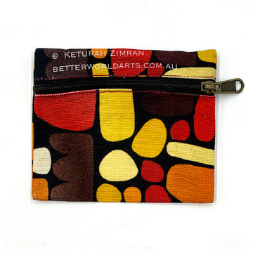 A square shaped pouch printed with artwork by Keturah Nangala Zimran with a black zipper across the top half.