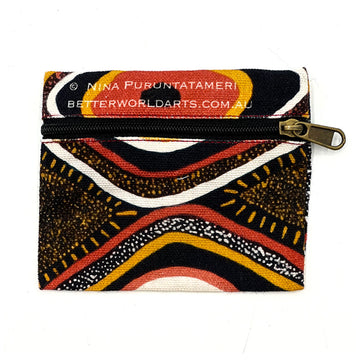 A square shaped pouch printed with artwork by Nina Puruntatameri with a black zipper across the top half.