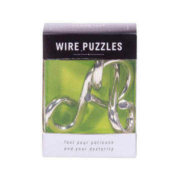 A puzzle made from twisted stainless steel inside a box with the heading 'Wire Puzzles'.