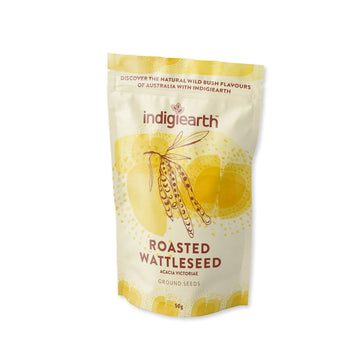 A light yellow packet with yellow overlays and a line drawing of a wattleseed plant in brown. The text 'Indigiearth Roasted Wattleseed' is written in brown.