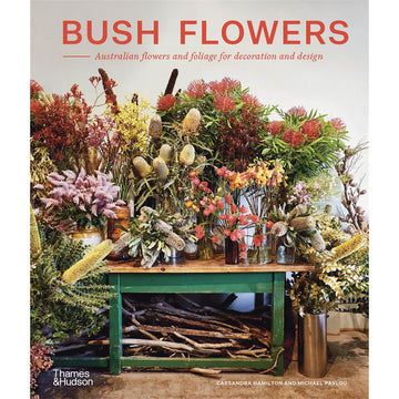'Bush Flowers' book cover featuring arrangements of flowers on a work table.