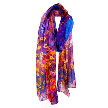A cotton scarf printed with artwork by Stephen Jupurrula Nelson in pink, purple, blue and yelllow.