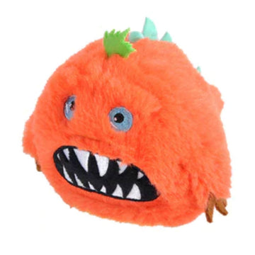 An orange soft toy monster with an open mouth showing teeth inside and two eyes.