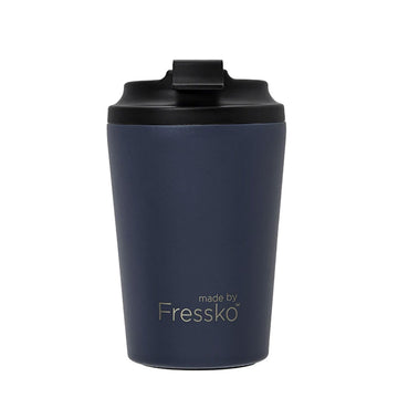 A denim blue reusable coffee cup with a black lid and the text 'made by Fressko' written on the bottom.