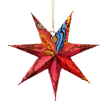 A 3D paper star with seven points and printed with artwork by Damien & Yipli Marks.