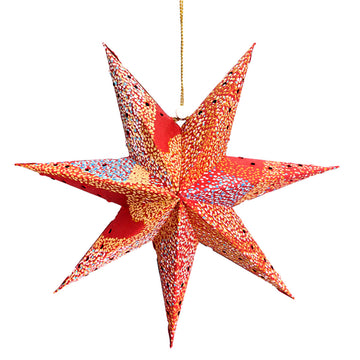 A 3D paper star with seven points and printed with artwork by Lynette Brown.
