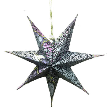  A 3D paper star with seven points and printed with artwork by Pauline Singleton.