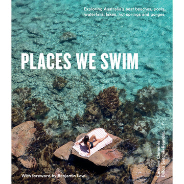 'Places we Swim' book cover featuring a top down photo of a woman lying on a towel on rocks next to clear water.