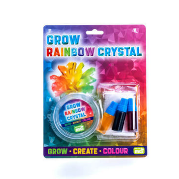 'Grow Rainbow Crystal' packaging featuring plastic attached to a rainbow coloured card. Inside the plastic are coloured dyes and a container for the crystal.