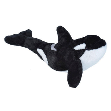 A soft toy in the shape of a black and white orca whale.