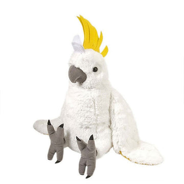A soft toy in the shape of a white cockatoo sitting down.