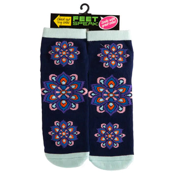 A pair of socks printed with mandalas are hanging off a hanger.