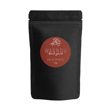 A black packet with a round brown label on the front with the text 'Warndu Feel Good Anise Myrtle'.