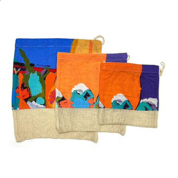 Three different size produce bags with a hessian strip on the bottom third and a cotton print by Karen Barnes on the top two thirds.