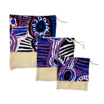 Three different size produce bags with a hessian strip on the bottom third and a cotton print by Murdie Morris on the top two thirds.