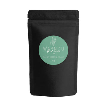 A black packet with a green round label on the front with the text 'Warndu Feel Good Native Lemon Grass'.