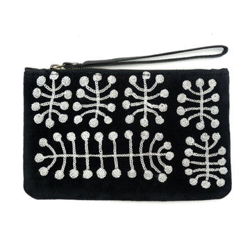 A black and white velvet clutch featuring artwork by Mitjili Napurrula on the front. There is a wrist strap attached to the zip along the top.