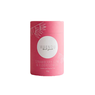 A pink canister with a white round label with the text 'Warndu Feel Good Strawberry Gum and Elderflower'.