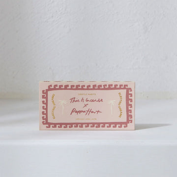A light pink rectangle box with a darker pink patterned border and the text 'This is because x Peppa Hart' written in the middle.