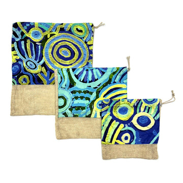 Set of three different sized produce bags printed with artwork by Cedric Varcoe on the top two thirds of the bag.