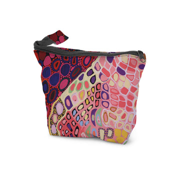 A cosmetic bag with a zip along the top and printed with artwork by Amanda Jane Gabori.