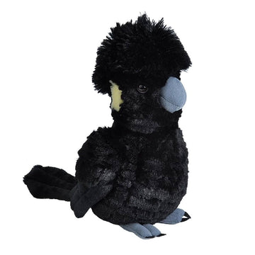 A soft toy in the shape of a black cockatoo with yellow details.