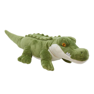 A soft toy in the shape of a green and cream crocodile.