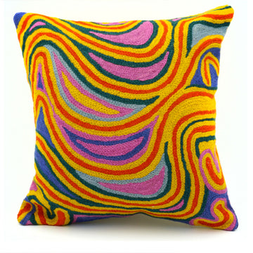 A cushion made from chain stitched wool and printed with artwork by Liddy Walker.
