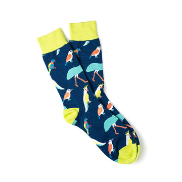 A pair of dark blue socks with yellow cuffs, heels and toes and printed with different Australian birds.