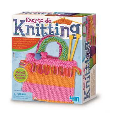 Front cover  of Knitting Art Easy to Do kit featuring a photo of a completed knitted bag with knitting needles inside.