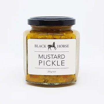 A clear jar with a black lid and white product label. The label says 'Black Horse Mustard Pickle' with an image of a horse. The mustard can be seen through the clear jar.