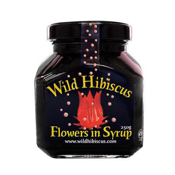 Gleaming black glass jar and metal lid, black label with red hibiscus flower and bubbles. Wild hibiscus flowers in syrup in yellow type, tamper proof tab.