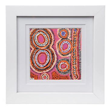 Square picture of artwork by Murdie Morris featuring a circle design in pink, orange and black inside a white frame.