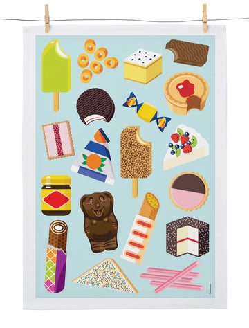 A tea towel printed with illustrations of different Australian snacks including a meat pie, lamington, fairy bread and vegemite.
