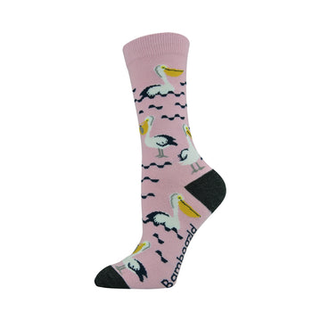 A pink sock is picture with a black heel and toe and a pelican print all over.