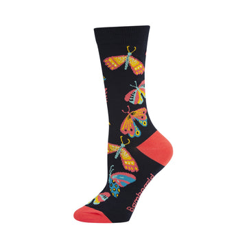 A black sock is pictured with a red heel and toe and a butterfly print over the sock.
