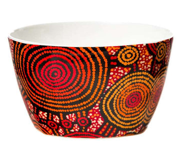 Bone China nut bowl height 6.5cm featuring artwork by Teddy Gibson. Red background: red, orange, and black circles joined by lines; white, orange dot art. White glaze inside, Australian made.